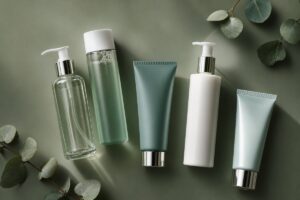 Skincare cleanser products on dark sage green background, Best Face Cleansers on Amazon UK